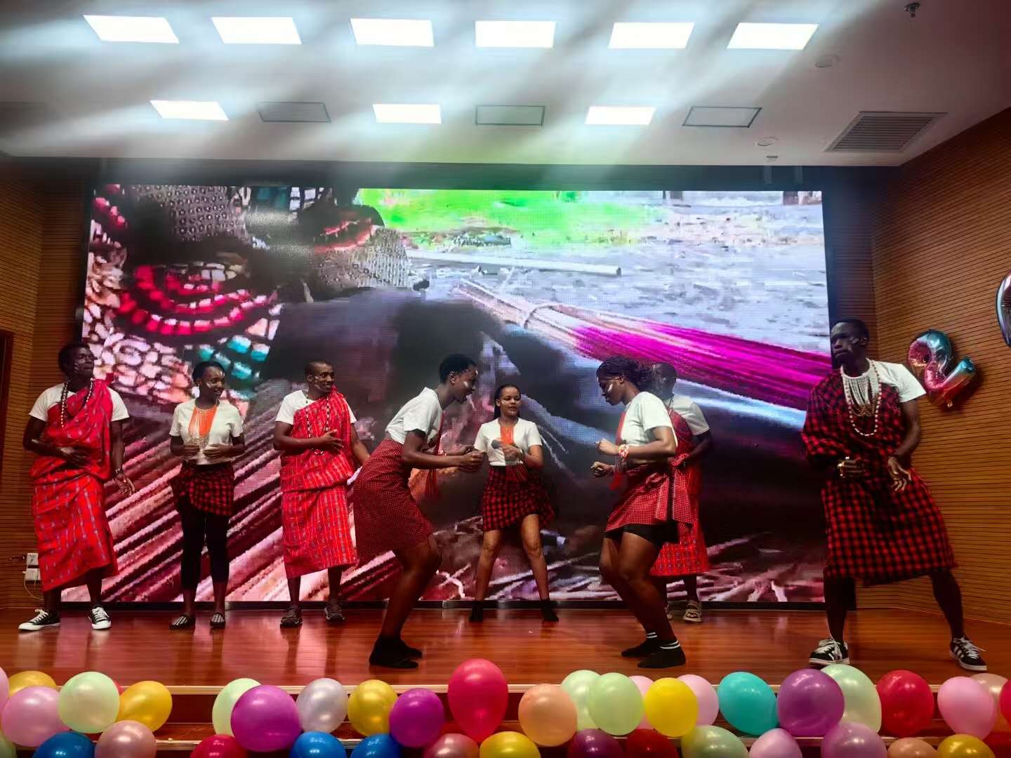 perfoming kenyan cultural dance during graduation party.2024