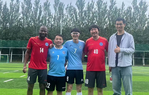 Taken at the teachers day soccer game in 2024. Diaby and his supervisor playing in the same team against other other workmates.